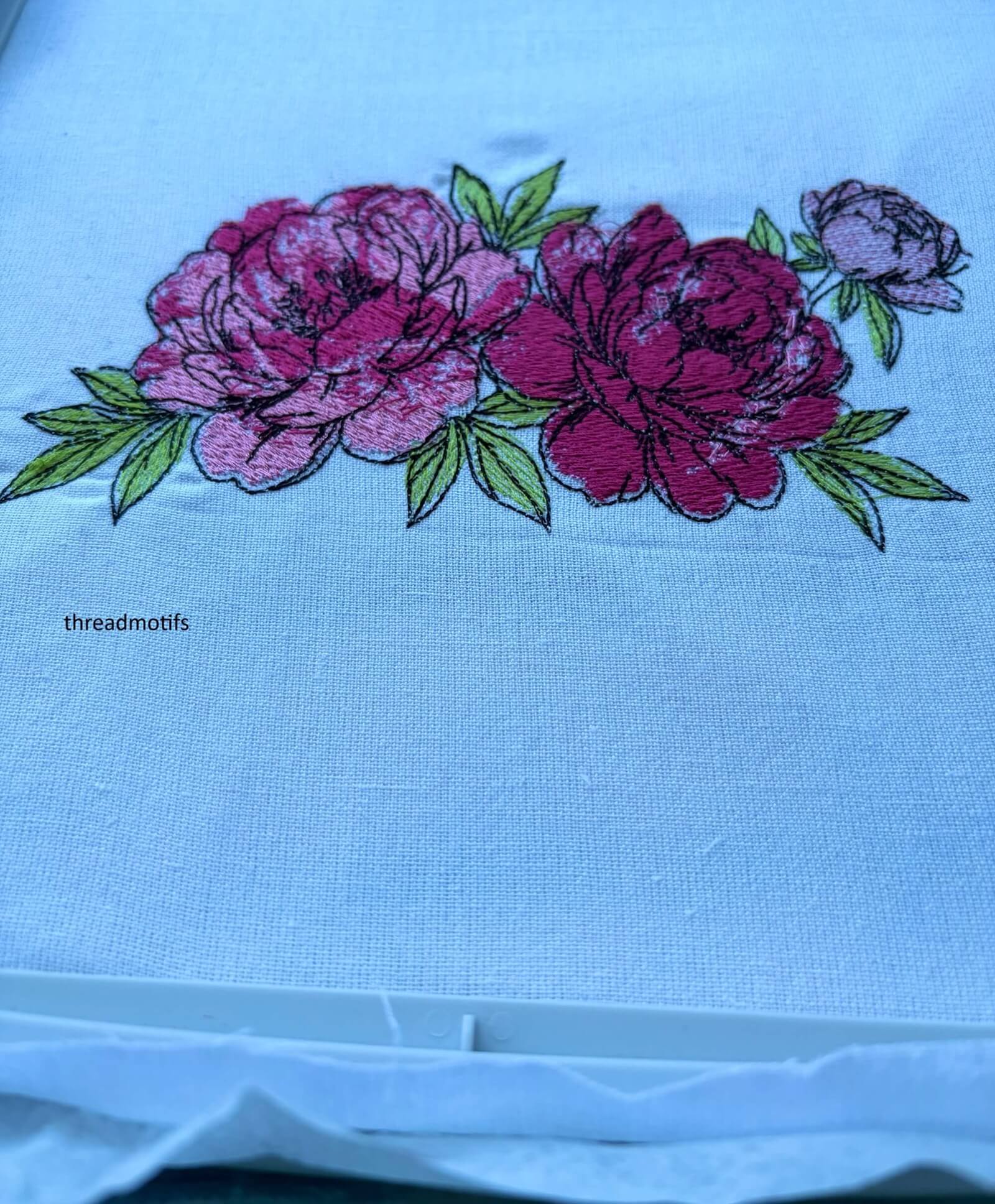 machine embroidery design of poenies floral